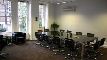 Glass topped boardroom table