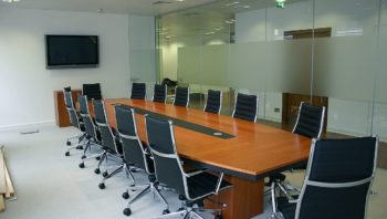 Polished oak pier boardroom table