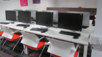 Orange and white computer area