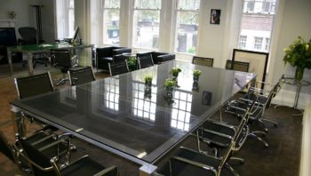 Glass top boardroom table