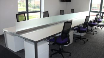 Multiple user two sided desk