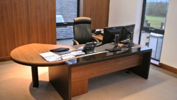 Light walnut desk with matching storage