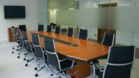 Polished oak boardroom furniture table