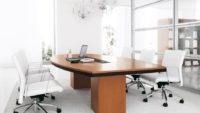 Meeting table and white leather chairs